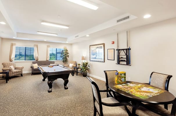 Interior common area with seating and pool table