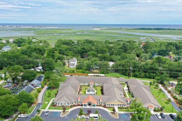Aerial view of Inlet Coastal Resort with surrounding landscape