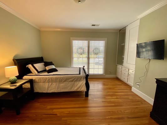 Cozy private resident room with a bed and natural light