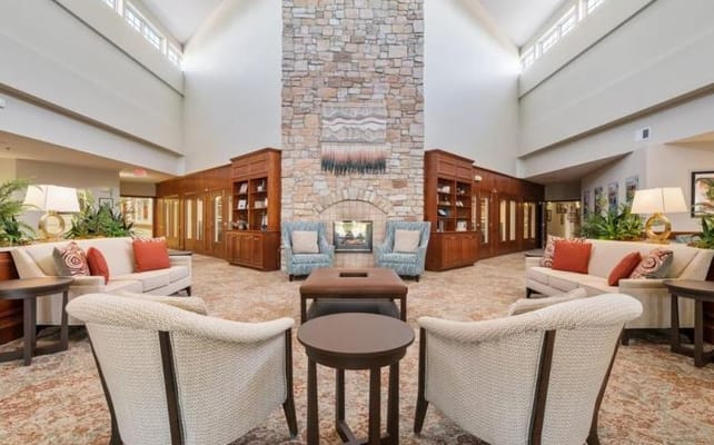 Common area with comfortable seating and a fireplace