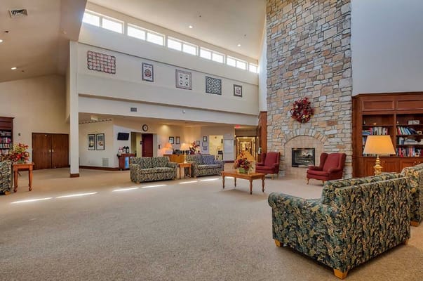 Common area with seating and fireplace