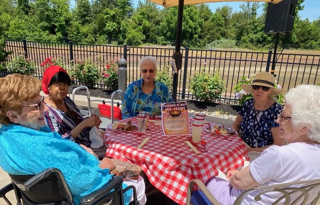 Residents enjoying a picnic in an outdoor space