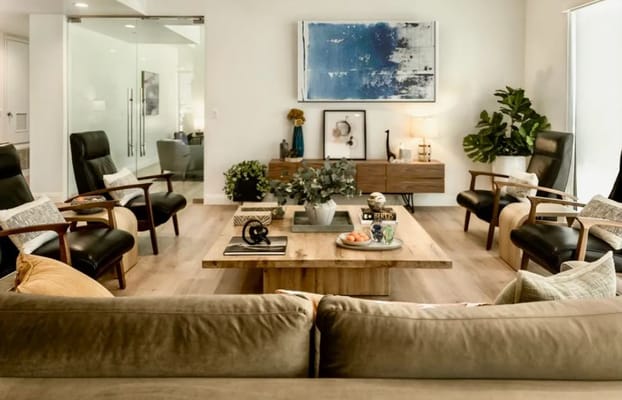 Bright common area with comfortable seating and decor