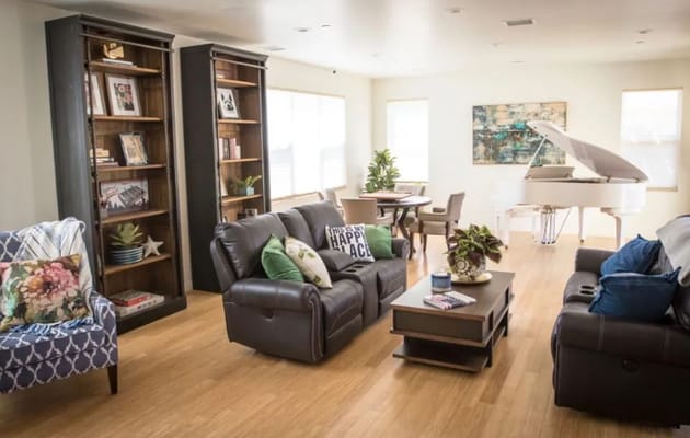 Bright common area with seating and decor