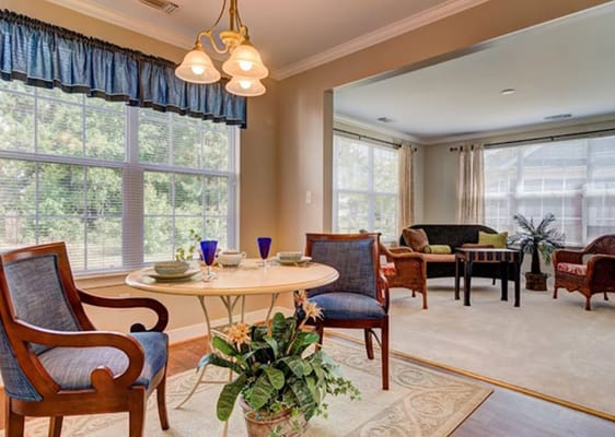 Cozy common area with a dining table and seating arrangement