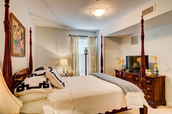 Cozy resident room with a bed and furniture