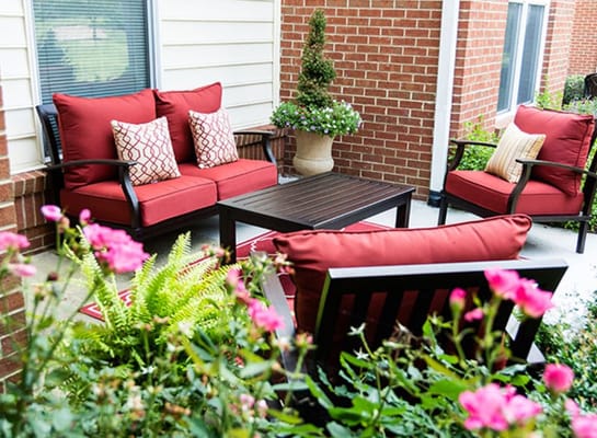 Cozy outdoor seating area with flowers