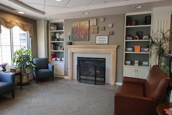 Cozy common area with seating and a fireplace