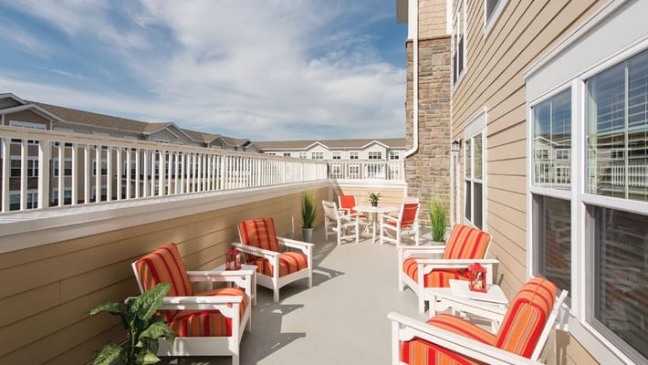 Outdoor seating area with chairs and table