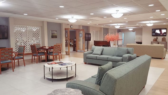 Common area with seating and a piano