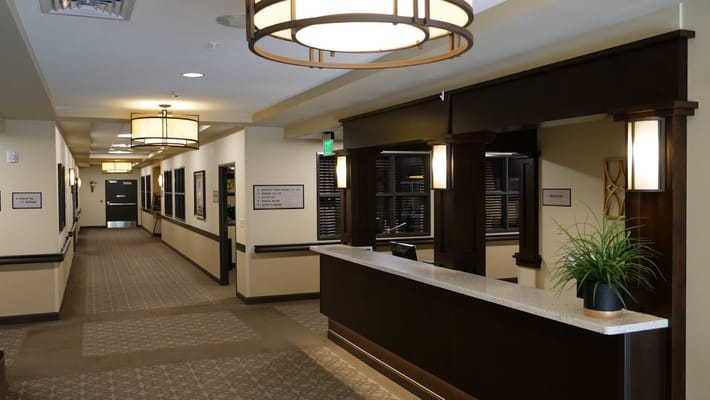 View of the reception area in Laurel Cove Community with warm lighting and a welcoming atmosphere.