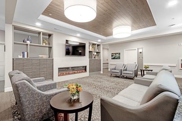 Bright common area with comfortable seating and decor