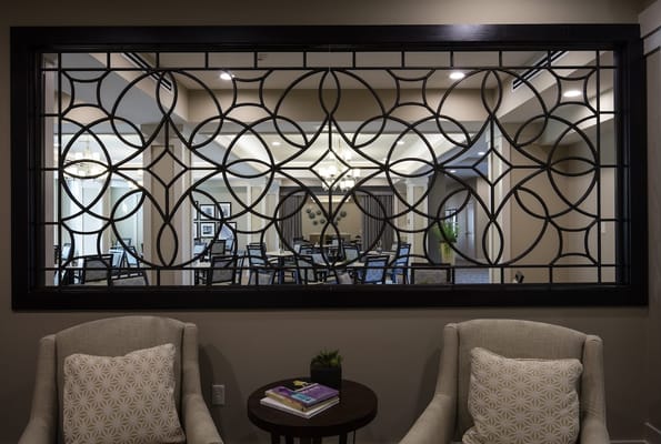 Interior view of a common area with decorative window