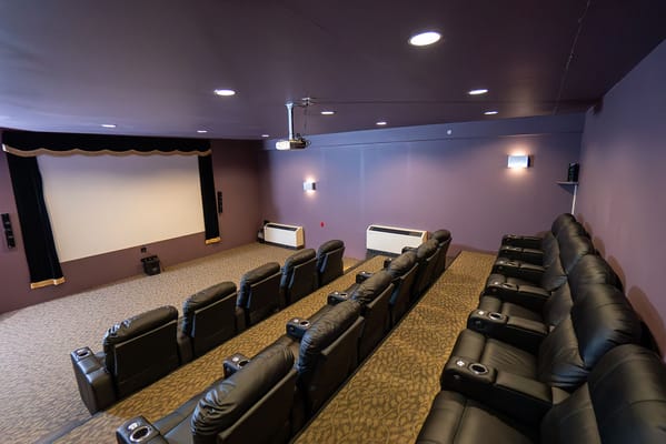 Interior view of a cinema room with seating