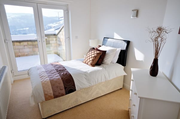 Bright, well-furnished resident bedroom