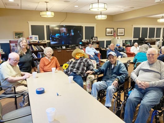 Residents enjoying a social gathering in a common area