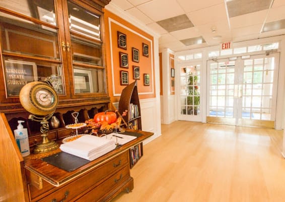 Interior view of a reception area with decor and awards