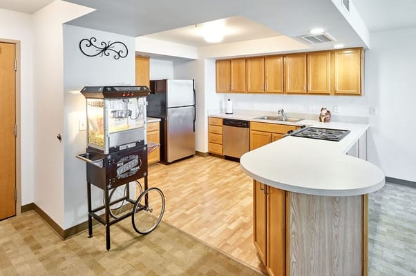 A modern kitchen area in a senior living apartment