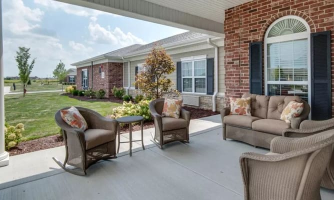 Outdoor seating area with comfortable furniture on the porch