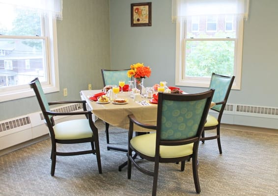 Dining table set with meals in a cozy dining room