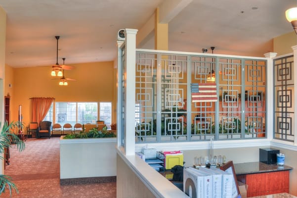 Interior lobby area with seating and decorative elements