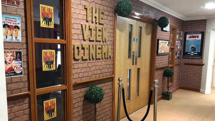 Interior hallway of a themed cinema area