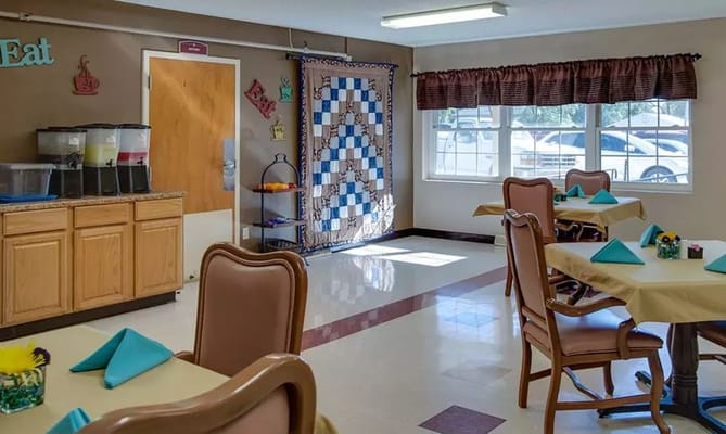 Bright dining area with tables and decor