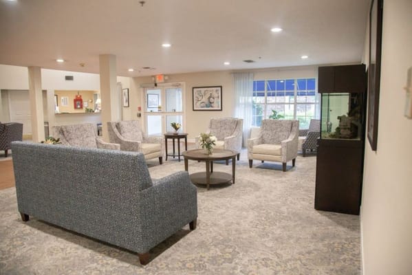 Interior view of a cozy common area with seating