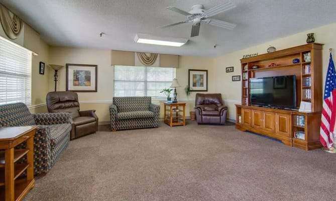 Comfortable living room with seating and a television