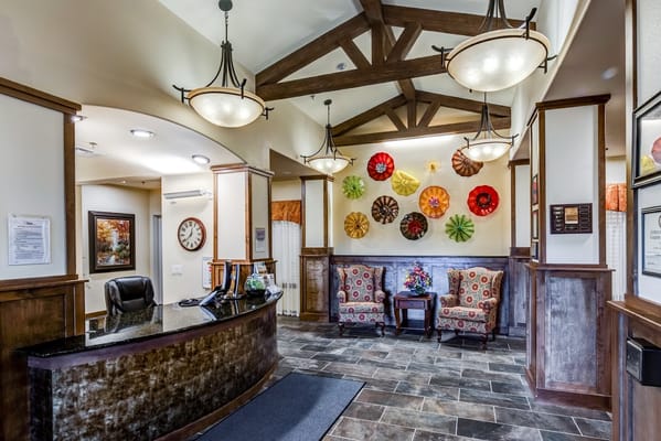 Lobby with reception desk and decorative wall art