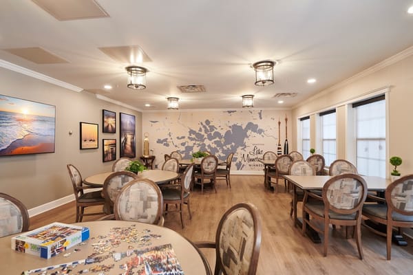 Dining room with tables, decor, and jigsaw puzzle