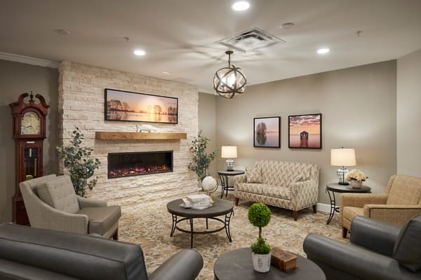 Cozy common area with comfortable seating and artwork