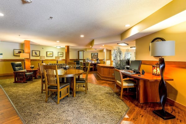 Bright common area with dining and seating space