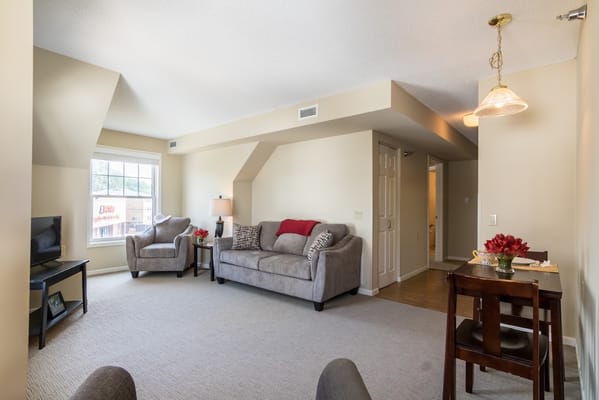 Bright common area with seating and decor