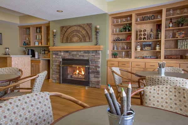 Cozy common area with a fireplace and seating