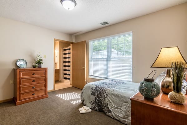 Cozy private bedroom in a senior living facility