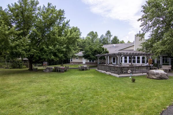 Outdoor space with seating and greenery