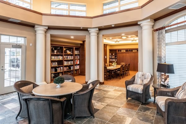Interior common area with bookshelves and seating