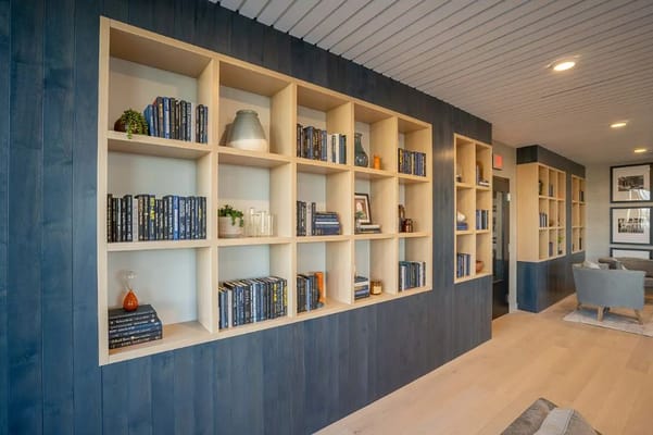 Interior view of a common area with built-in bookcases