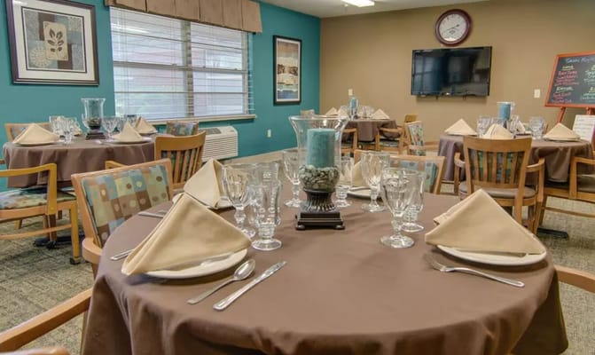 Dining area set with elegant table settings