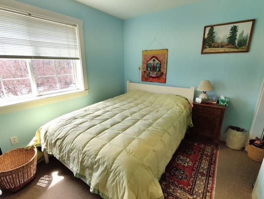 Cozy private resident room with a bed and window