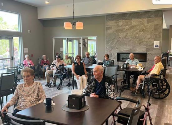 Residents socializing in a bright common area