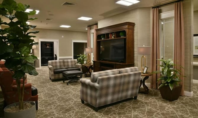 Inviting living room with comfortable seating and plants