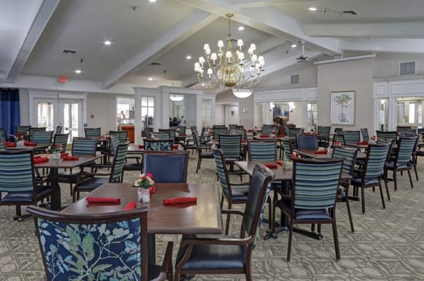 Dining room with tables set for meals