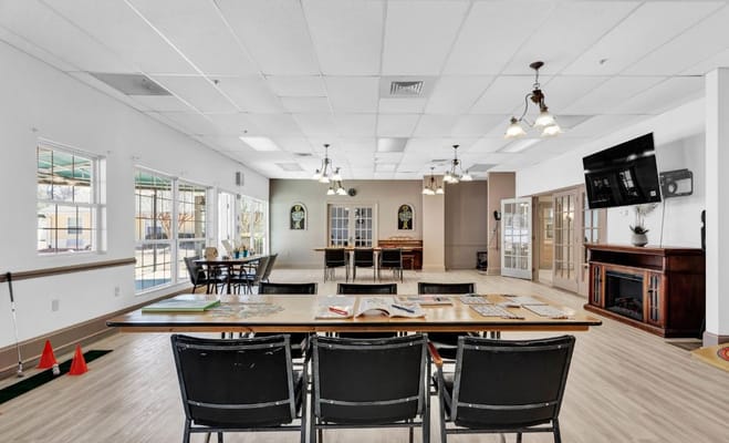 Bright common area with tables and seating