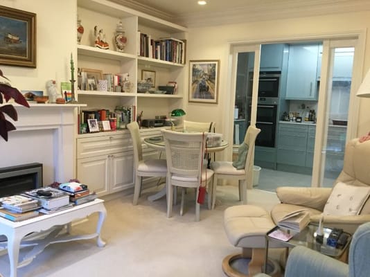 Cozy common area with bookshelves and seating