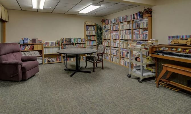 Interior view of a cozy reading room with bookshelves