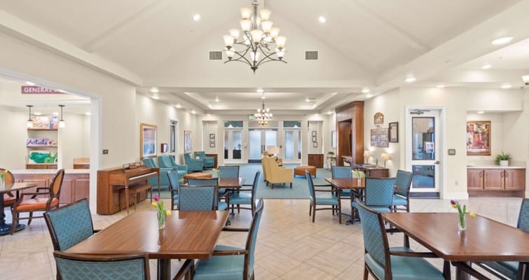Bright common area with tables and seating