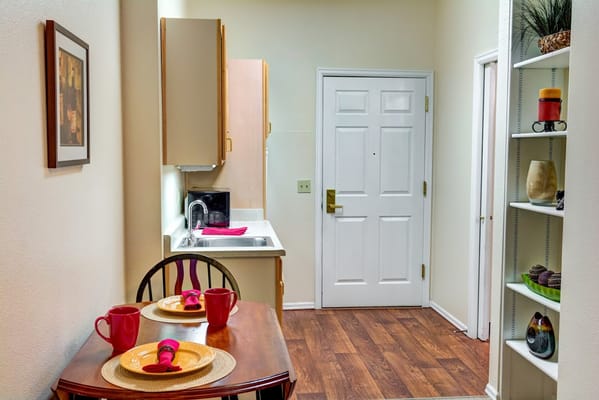 Cozy dining area in an assisted living apartment