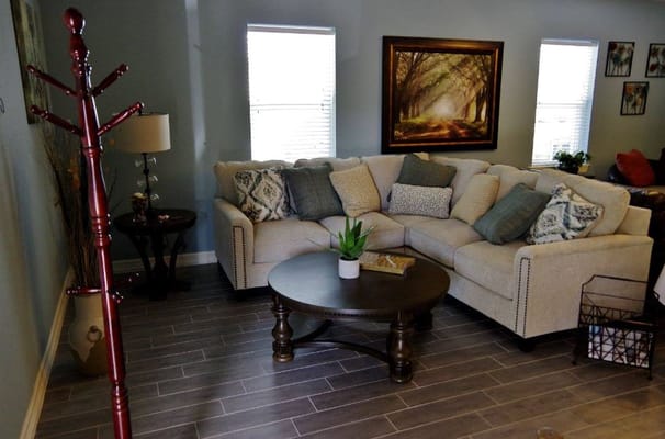 Cozy common area with seating and artwork